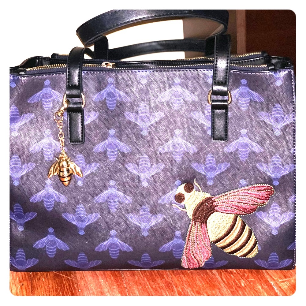 Christian Siriano 9x11 vegan purse with appliqué